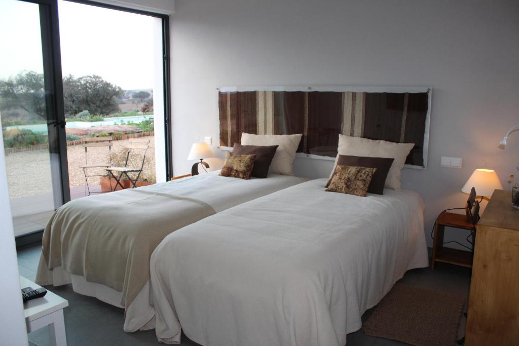 Quarto twin com vista para o jardim